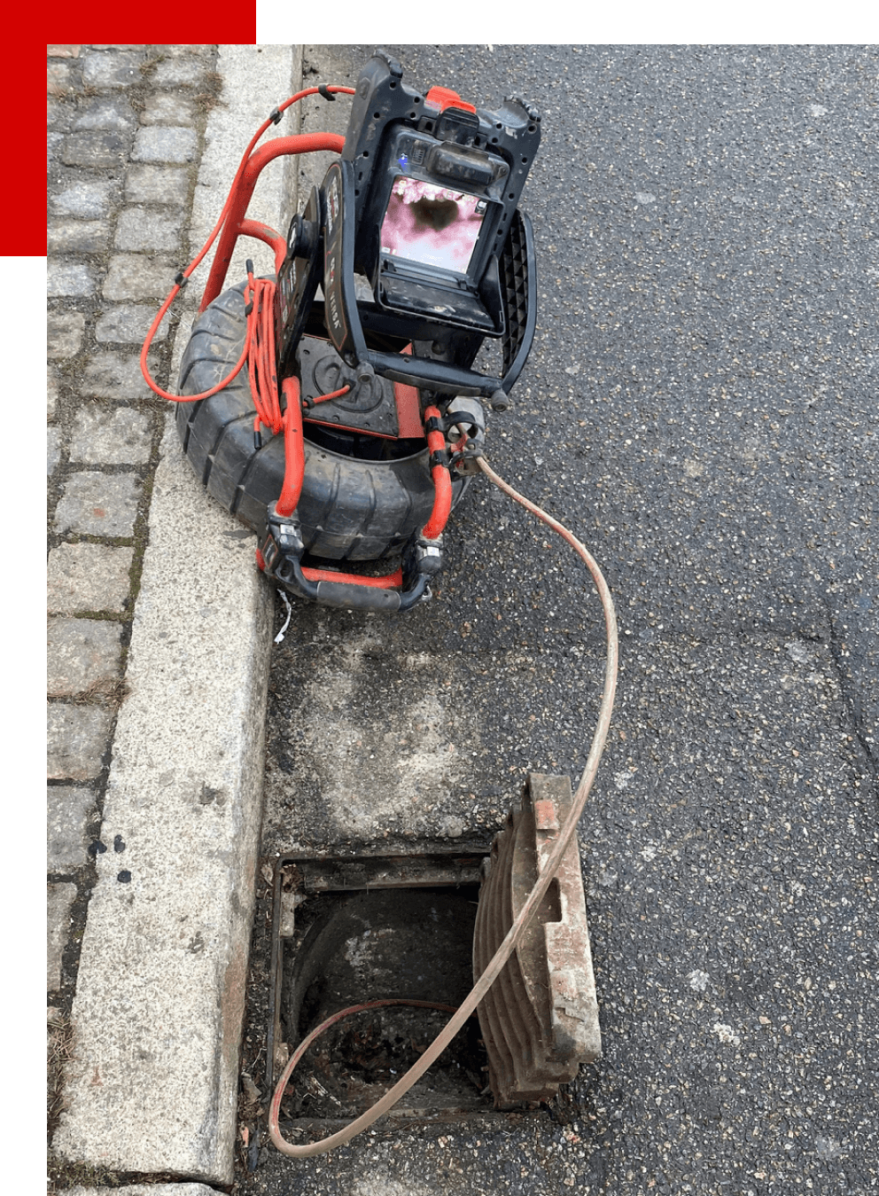 CCTV camera red and black road pipes